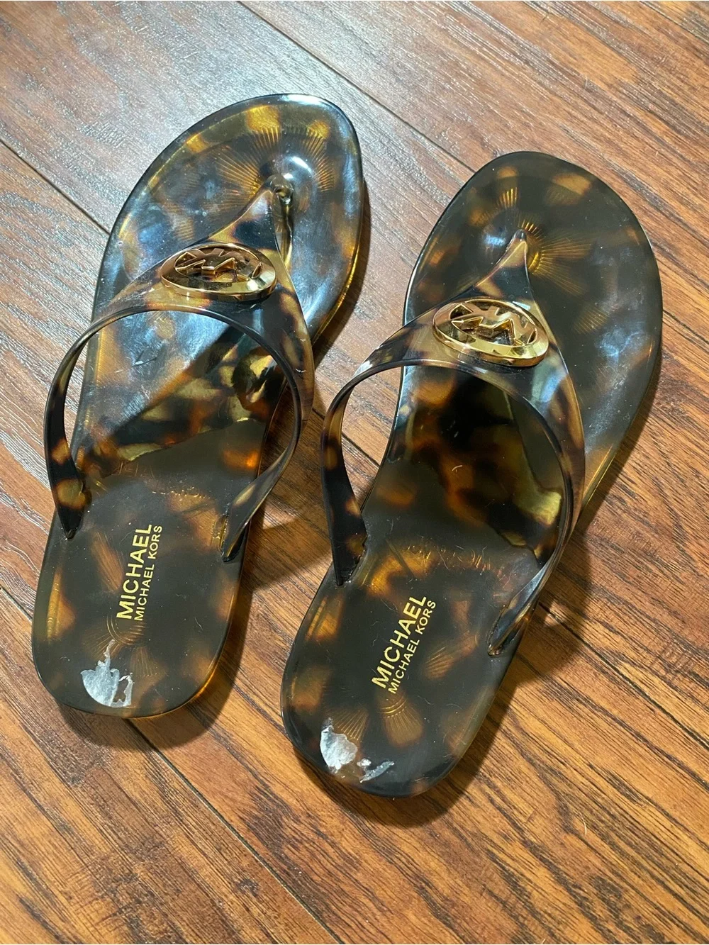 Michael Kors Tortoiseshell Logo Jelly Thong Sandals in Brown and Black